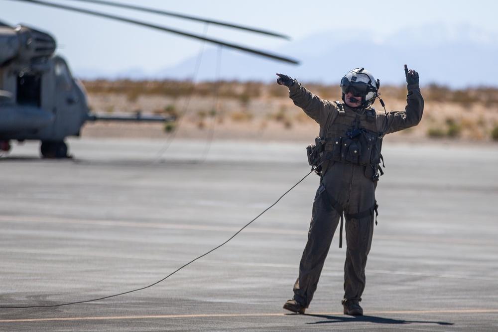 Green Berets fast rope out of Marine aircraft
