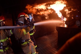 Student mariners learn to handle smoke, douse flames in darkness
