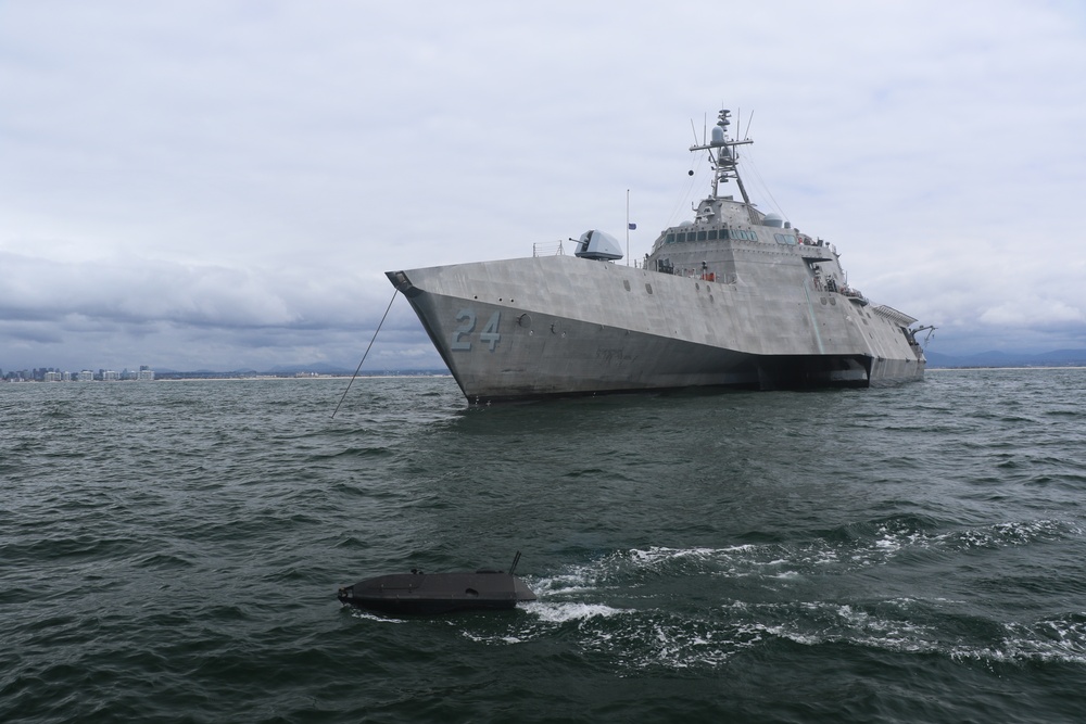 ADARO unmanned system interacts with the Navy’s newest Independence-variant littoral combat ship USS Oakland (LCS 24)