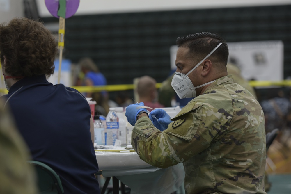 U.S. Army 25th Infantry Division Soldiers Assist Guam Department of Public Health and Social Services COVID-19 Vaccine Clinic