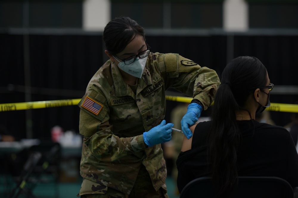 U.S. Army 25th Infantry Division Soldiers Assist Guam Department of Public Health and Social Services COVID-19 Vaccine Clinic