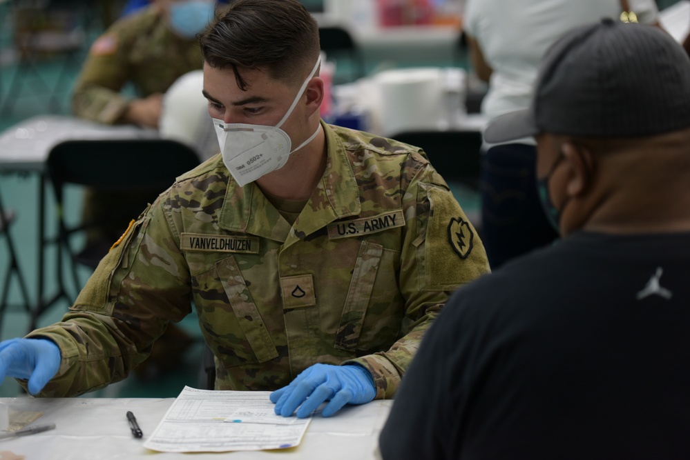 U.S. Army 25th Infantry Division Soldiers Assist Guam Department of Public Health and Social Services COVID-19 Vaccine Clinic