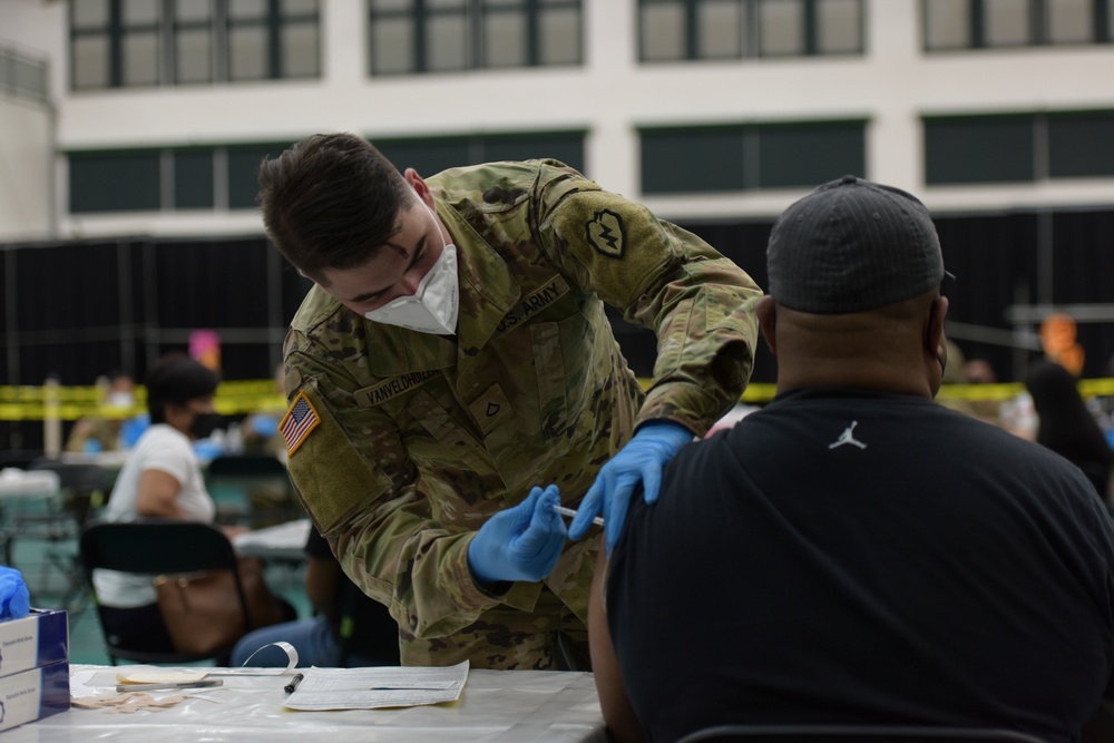 U.S. Army 25th Infantry Division Soldiers Assist Guam Department of Public Health and Social Services COVID-19 Vaccine Clinic