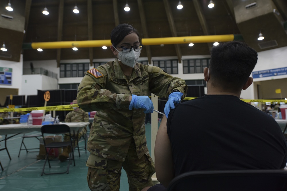 U.S. Army 25th Infantry Division Soldiers Assist Guam Department of Public Health and Social Services COVID-19 Vaccine Clinic