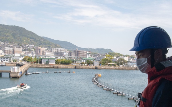 USS America Sailor Secures Line During Small Boat Operations