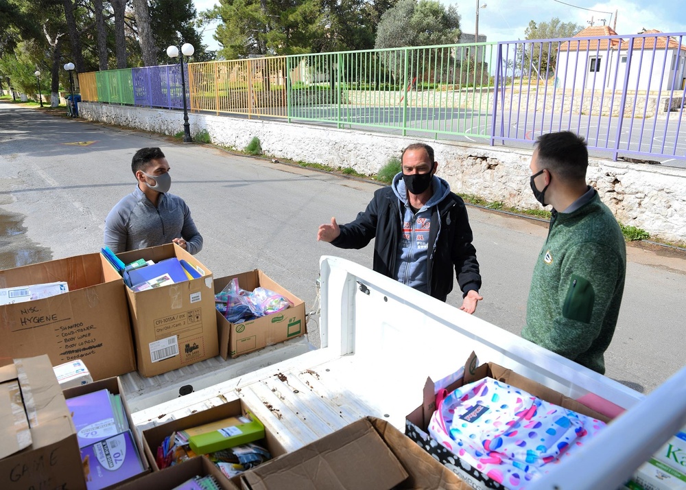 U.S. Navy Sailors participate in a Community Relations Project