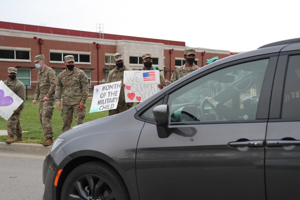 1st Theater Sustainment Command Soldiers honor military children at local school