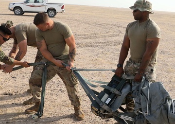 1st TSC Soldiers successfully precision-airdrop GPS-guided pallets in Kuwait test