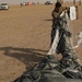 1st TSC Soldiers successfully precision-airdrops GPS-guided pallets in Kuwait test