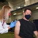 Iowa Hawkeye and NFL football star Dallas Clark receives COVID-19 vaccination in Sioux City