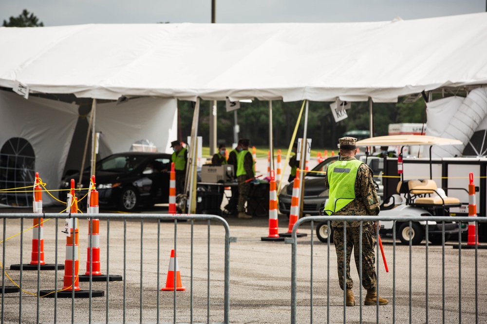 U.S. Marines and Sailors adjust operations after recent storms damage the site