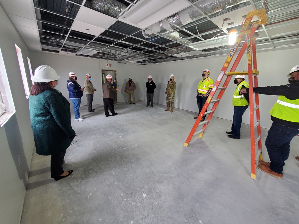 Visitors view construction of new, modern barracks building continues at Fort McCoy