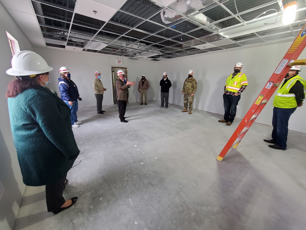 Visitors view construction of new, modern barracks building continues at Fort McCoy