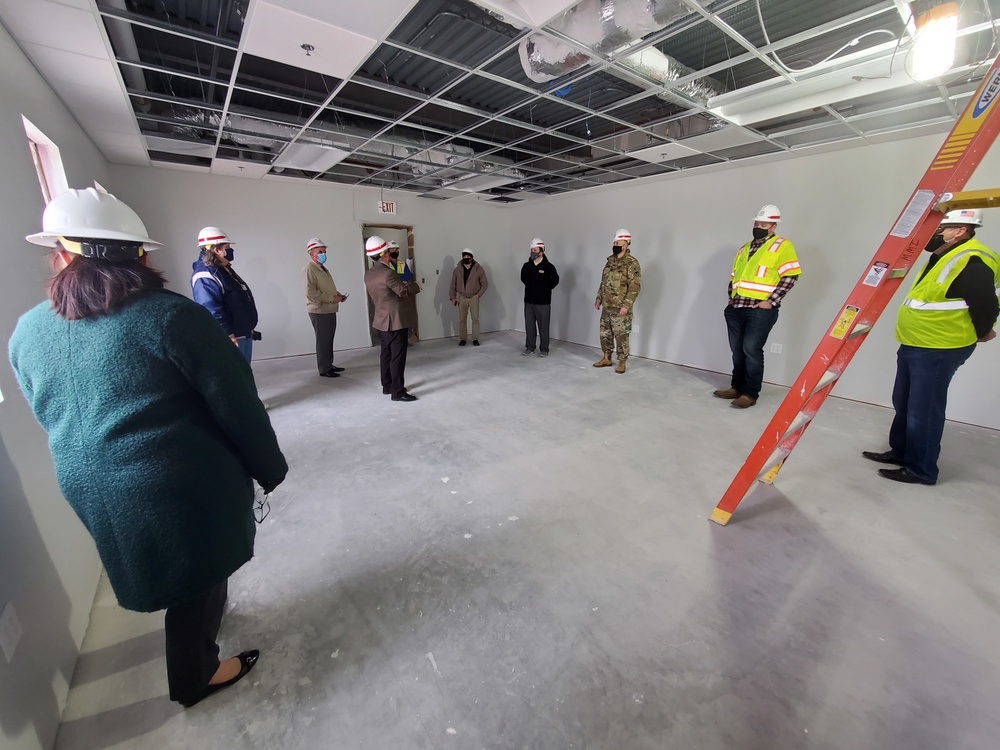 Visitors view construction of new, modern barracks building continues at Fort McCoy