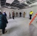 Visitors view construction of new, modern barracks building continues at Fort McCoy