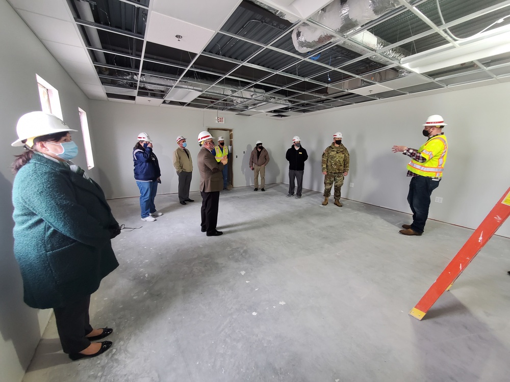 Visitors view construction of new, modern barracks building continues at Fort McCoy