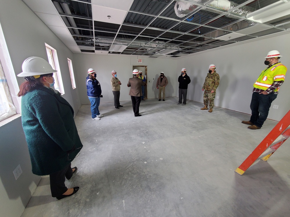 Visitors view construction of new, modern barracks building continues at Fort McCoy