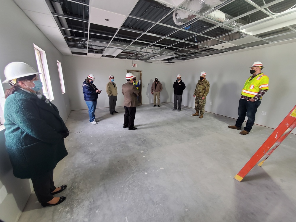 Visitors view construction of new, modern barracks building continues at Fort McCoy