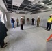 Visitors view construction of new, modern barracks building continues at Fort McCoy