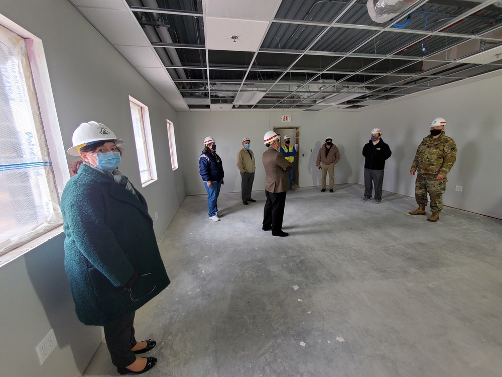 Visitors view construction of new, modern barracks building continues at Fort McCoy