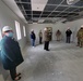 Visitors view construction of new, modern barracks building continues at Fort McCoy