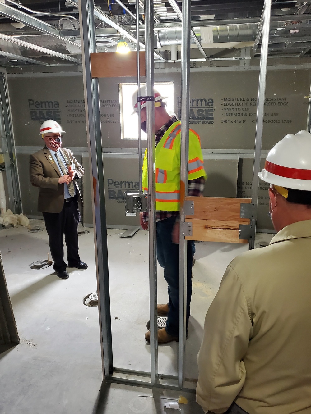 Visitors view construction of new, modern barracks building continues at Fort McCoy