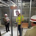 Visitors view construction of new, modern barracks building continues at Fort McCoy