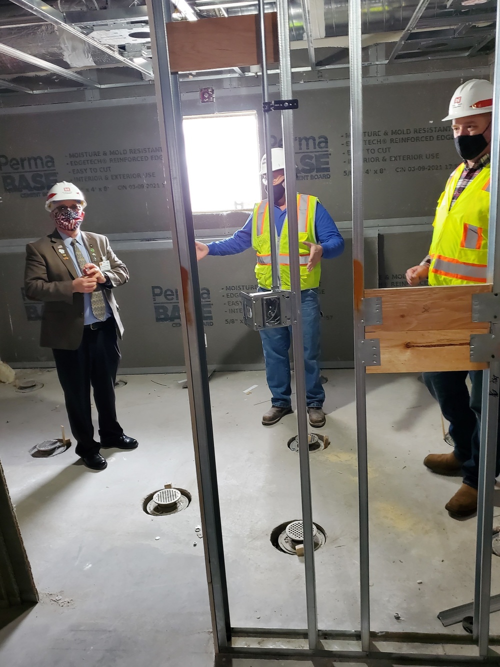 Visitors view construction of new, modern barracks building continues at Fort McCoy