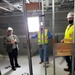 Visitors view construction of new, modern barracks building continues at Fort McCoy