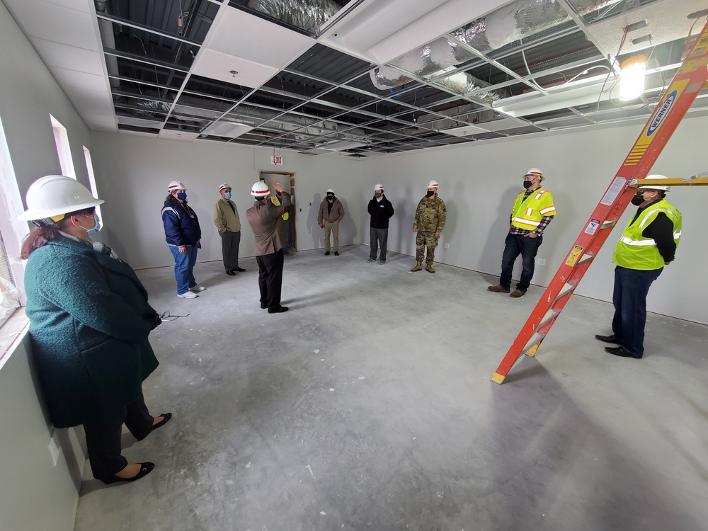 Visitors view construction of new, modern barracks building continues at Fort McCoy