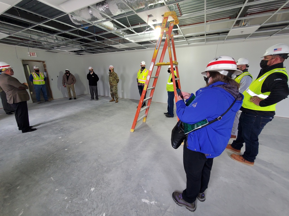 Visitors view construction of new, modern barracks building continues at Fort McCoy