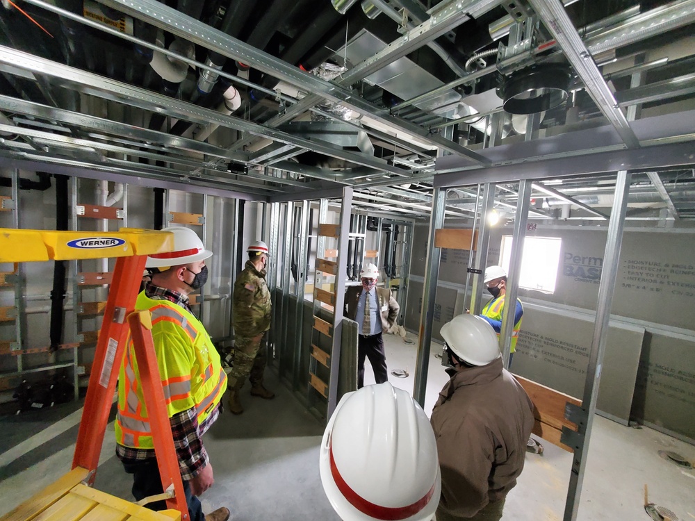 Visitors view construction of new, modern barracks building continues at Fort McCoy