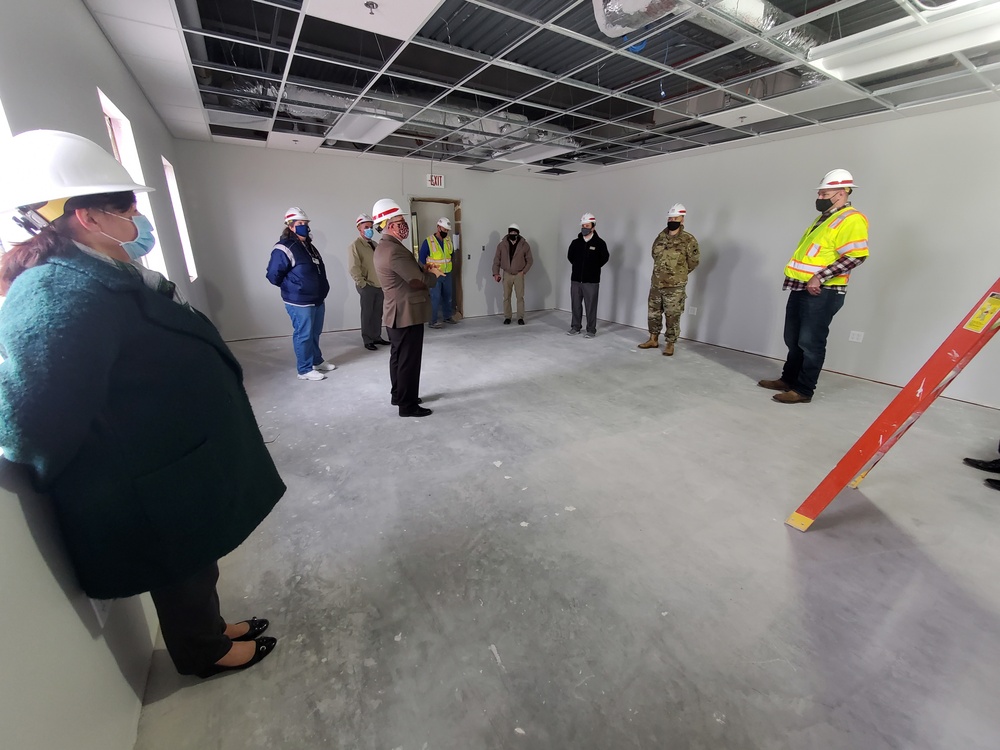 Visitors view construction of new, modern barracks building continues at Fort McCoy