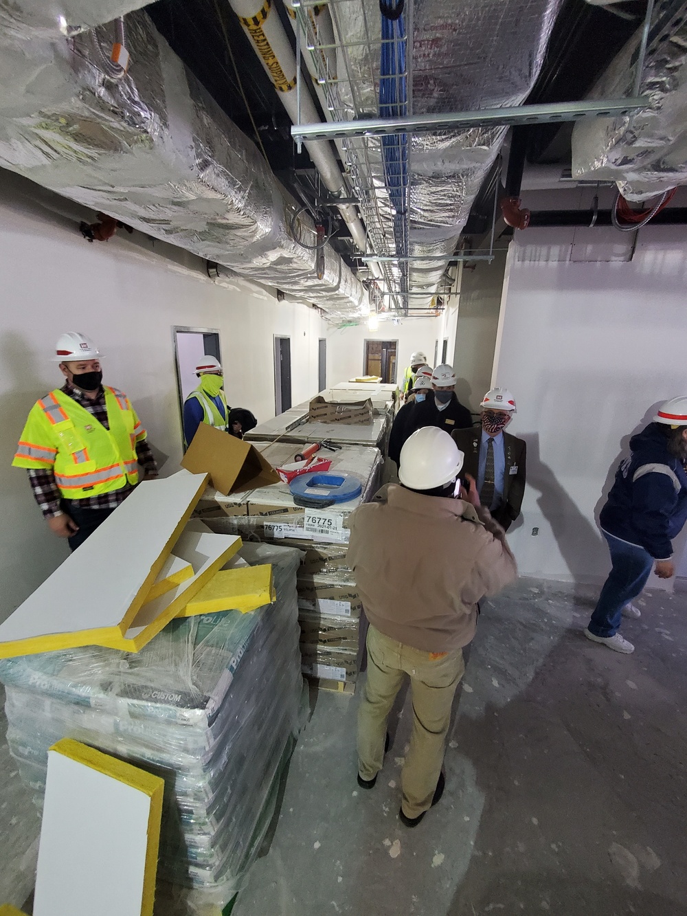 Visitors view construction of new, modern barracks building continues at Fort McCoy