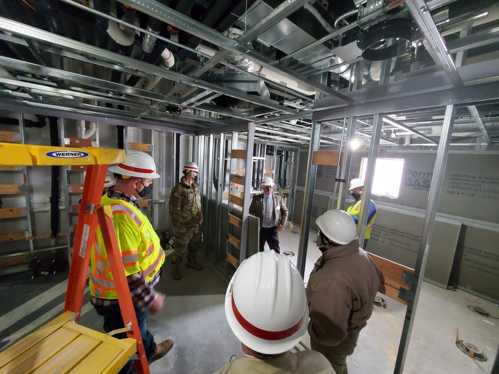 Visitors view construction of new, modern barracks building continues at Fort McCoy