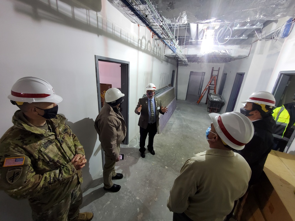 Visitors view construction of new, modern barracks building continues at Fort McCoy