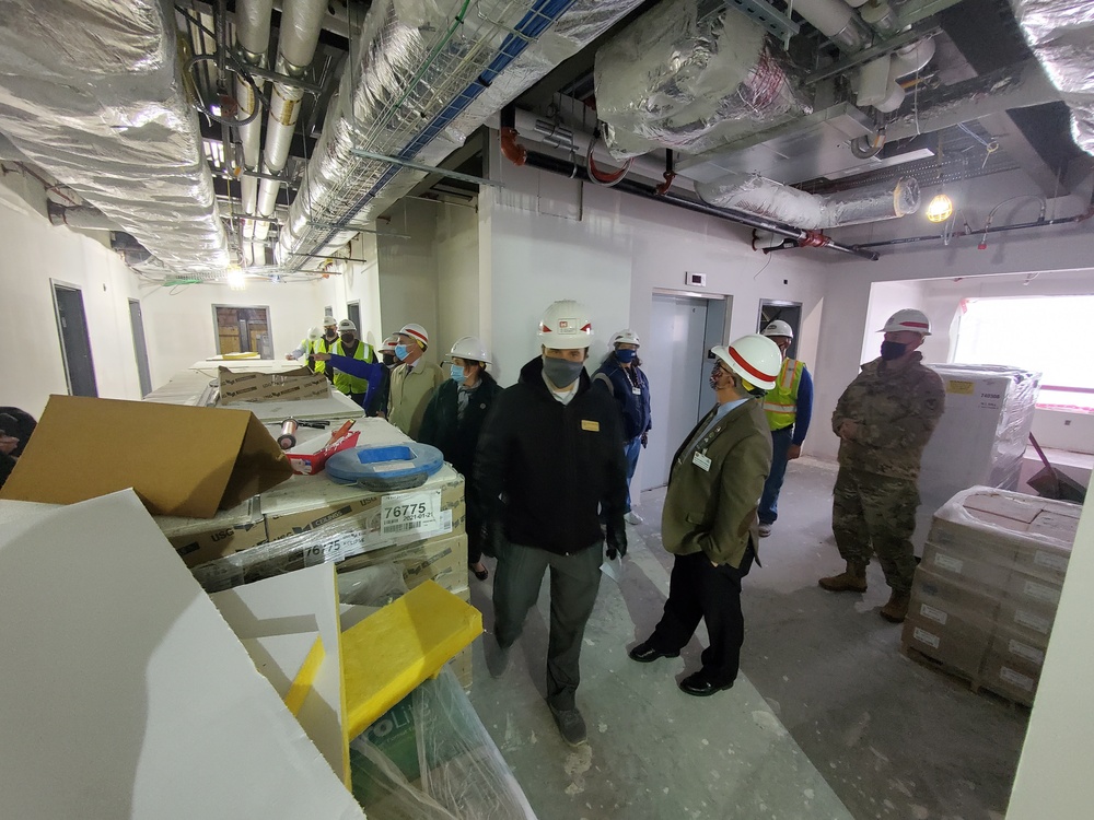 Visitors view construction of new, modern barracks building continues at Fort McCoy