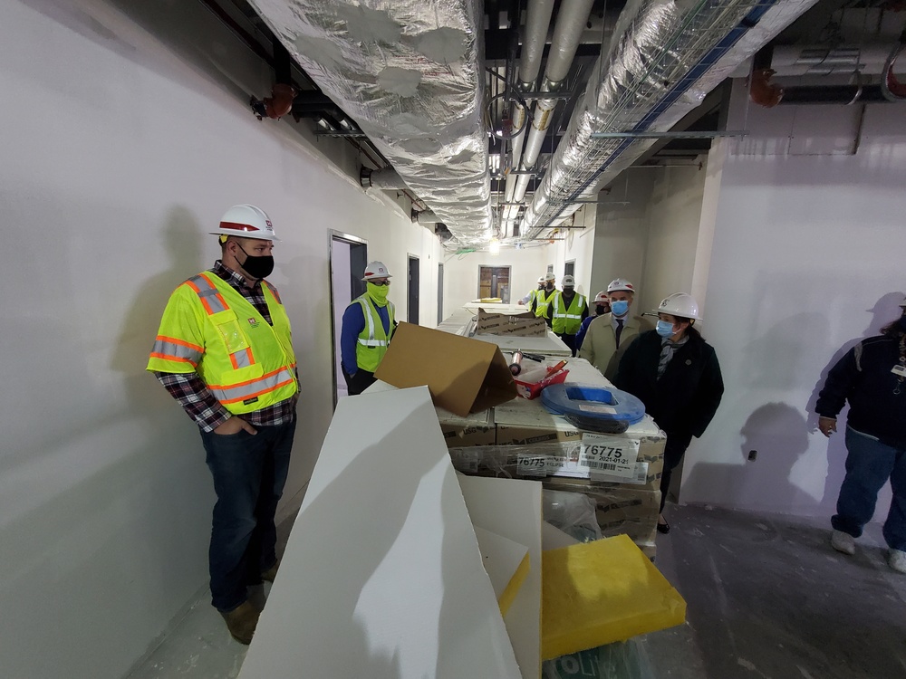 Visitors view construction of new, modern barracks building continues at Fort McCoy