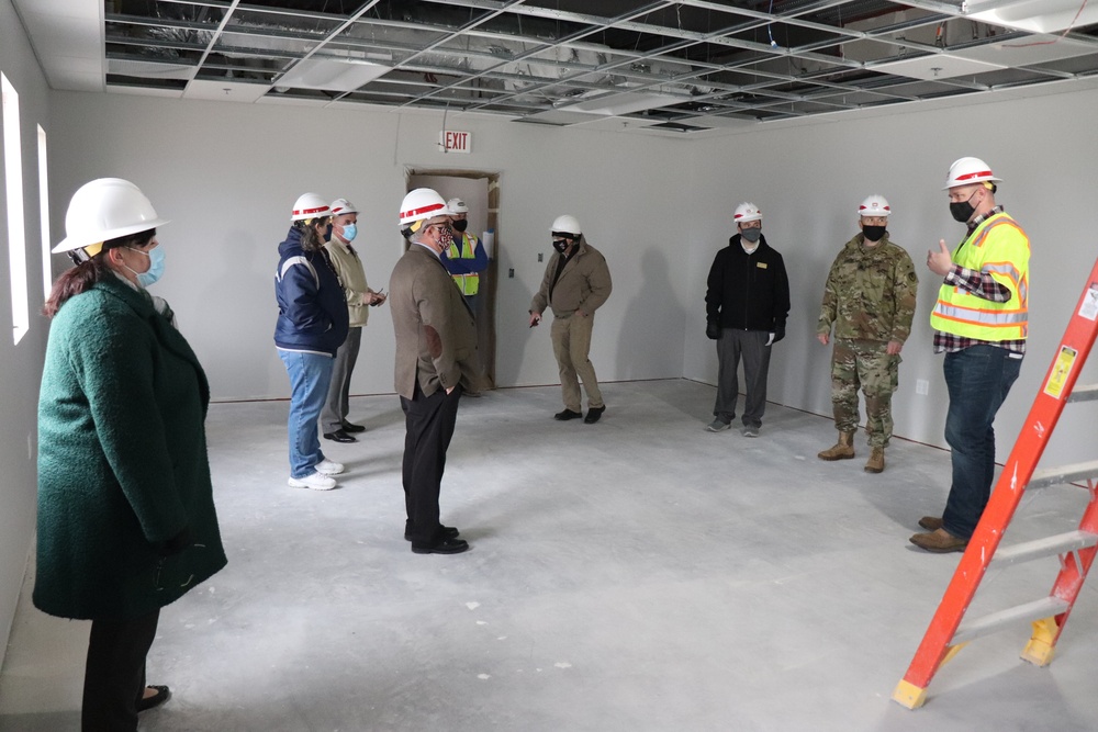 Visitors view construction of new, modern barracks building continues at Fort McCoy