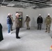 Visitors view construction of new, modern barracks building continues at Fort McCoy