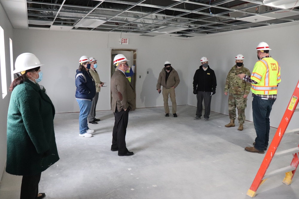 Visitors view construction of new, modern barracks building continues at Fort McCoy