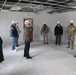 Visitors view construction of new, modern barracks building continues at Fort McCoy