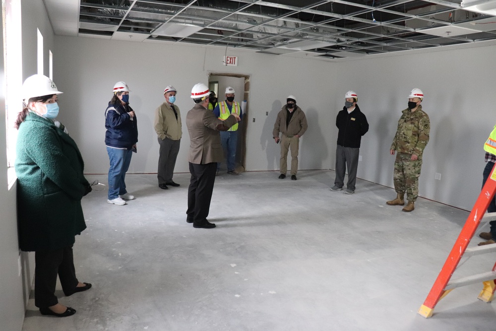 Visitors view construction of new, modern barracks building continues at Fort McCoy