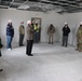 Visitors view construction of new, modern barracks building continues at Fort McCoy