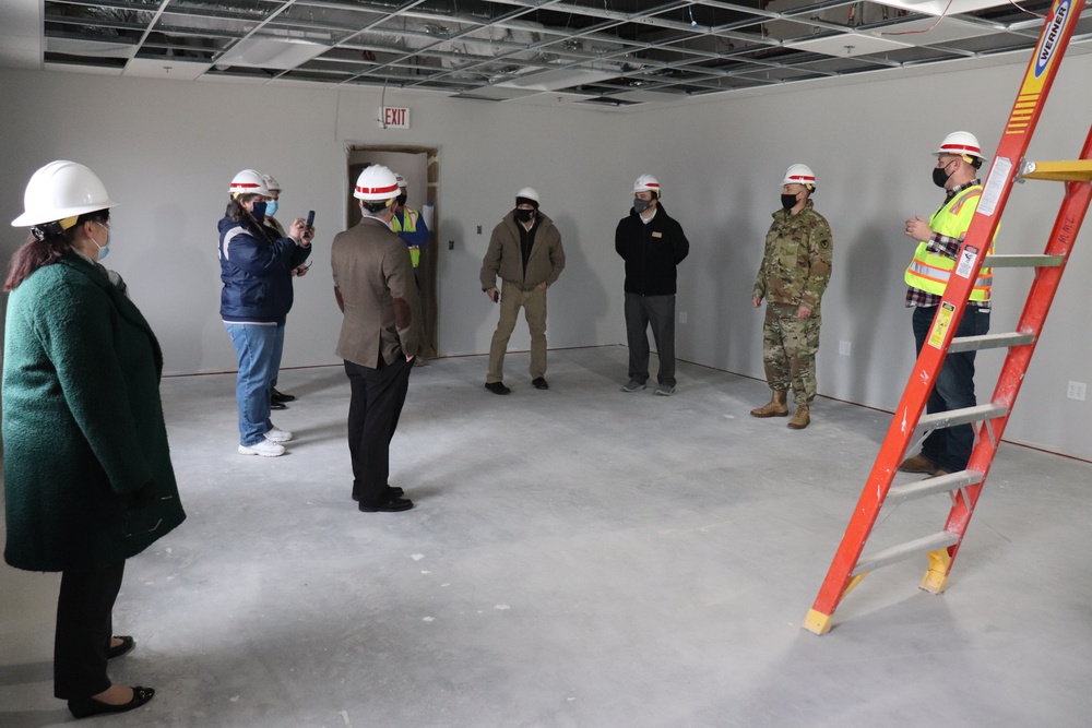 Visitors view construction of new, modern barracks building continues at Fort McCoy