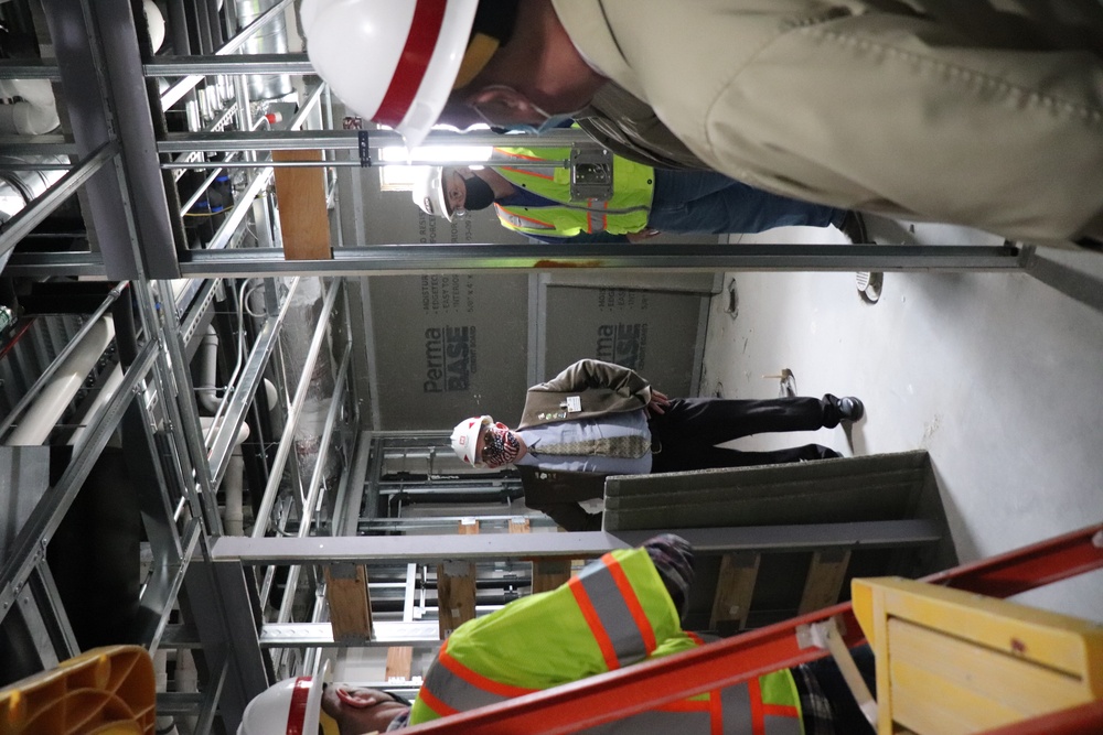 Visitors view construction of new, modern barracks building continues at Fort McCoy