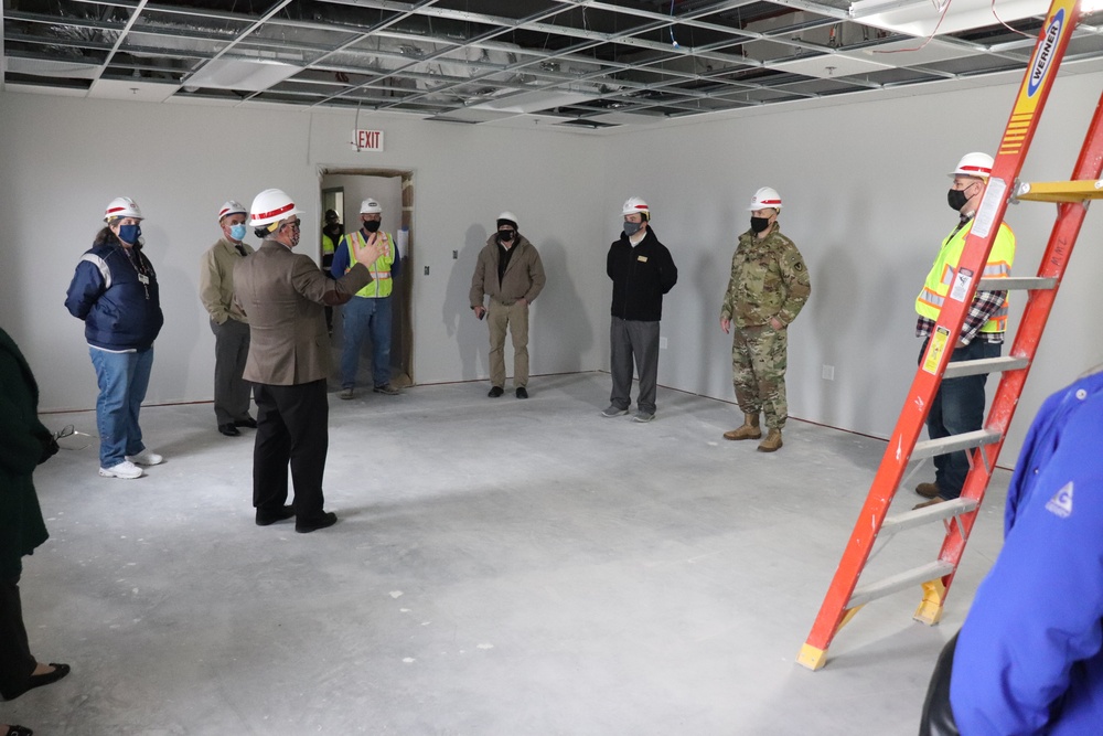 Visitors view construction of new, modern barracks building continues at Fort McCoy