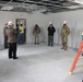 Visitors view construction of new, modern barracks building continues at Fort McCoy