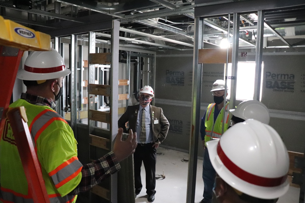 Visitors view construction of new, modern barracks building continues at Fort McCoy