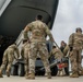 Aircrew from the 349th AMW move cargo as a part of exercise Nexus Dawn